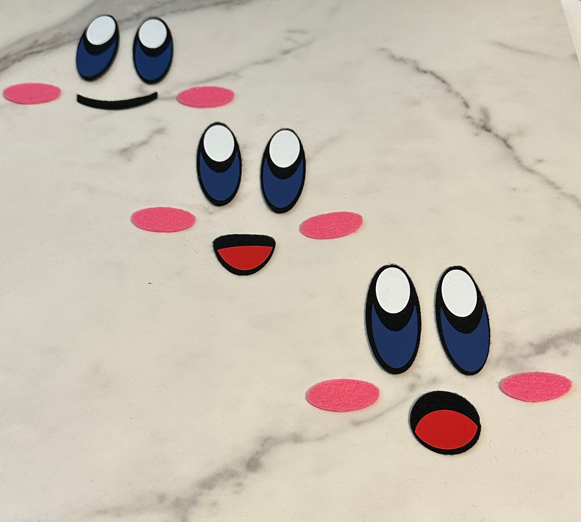 Premium pre-cut Kirby felt face with eyes cheeks and mouth