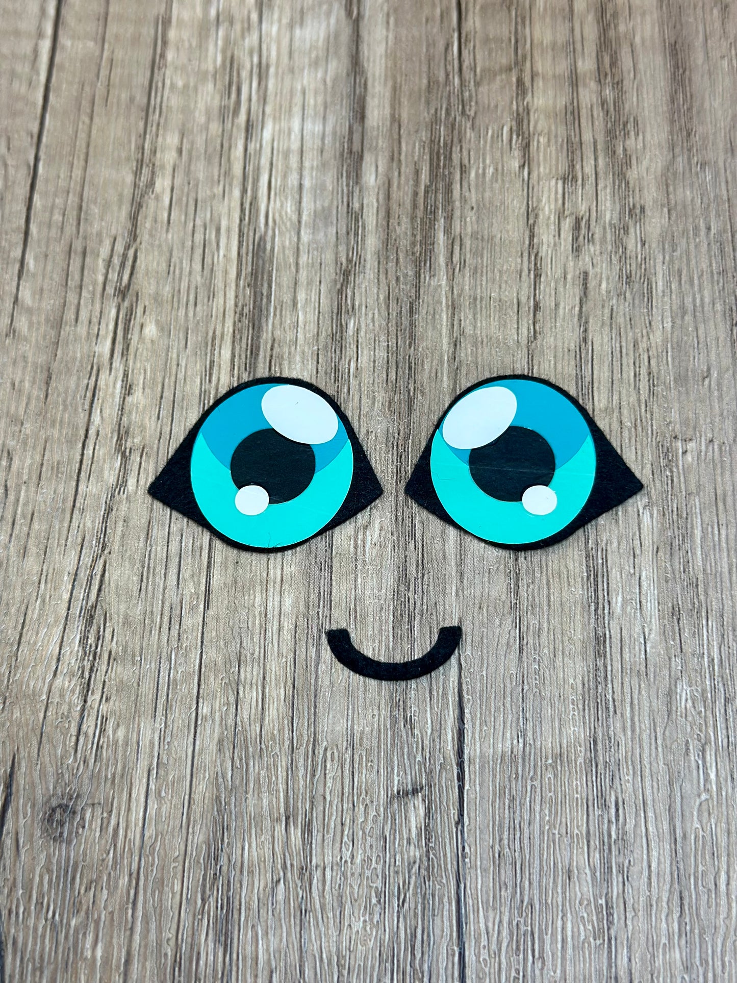 Fantasy creature felt eyes with HeatnBond backing